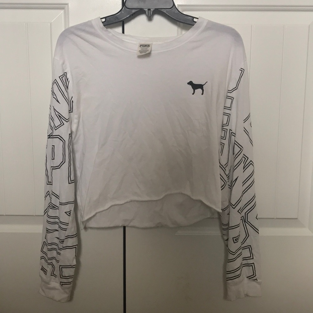 A pink vs crop top with long sleeves